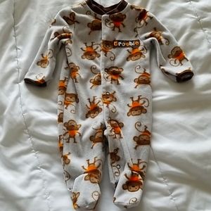 Baby's  fleece Buster Brown sleeper has monkeys on